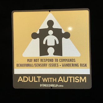 Reflective Adult Autism Sign